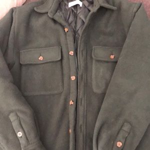 Deep green Color not true to picture. Very warm and cozy.